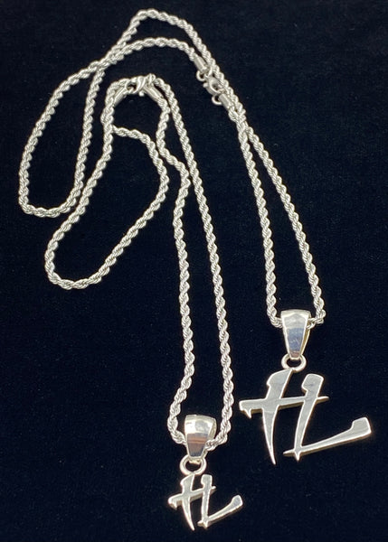 The small 'TL"chain and pendent on the left only  “TL” REAL Sterling Silver THE LIFE PENDANT SIZE 1/2” with a Stainless Steel Unisex Rope Chain Necklaces 20"(50.8cm) long, 2x1.5mm wide.